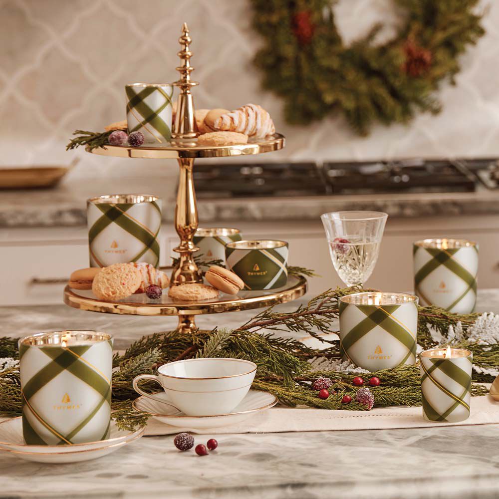 Thymes Frasier Fir Frosted Plaid Medium Candle is a Christmas Candle featured in decorated kitchen image number 4